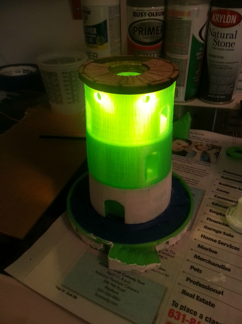 Illustration for article titled Light-Up Bioshock Infinite Lighthouse Cake Topper